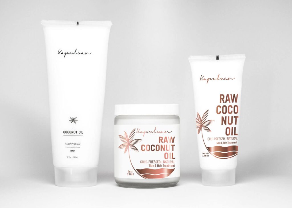 Three products from the kapuluan brand, including two tubes and one jar, labeled as coconut oil products, displayed against a plain white background.