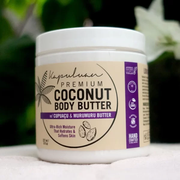 A jar of Body Butter w/ Cupuacu & Murumuru is shown. The label highlights that it includes cupuaçu and murumuru butter, is ultra-rich in moisture, hydrates and softens skin. It is also marked as vegan, GMO-free, hand-crafted, and animal cruelty-free.