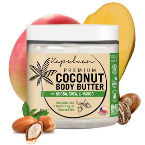 A jar of Kapuluan Body Butter with cupuaçu and murumuru, featuring a palm tree illustration. The package highlights its vegan, non-GMO, and cruelty-free attributes. Shea nuts and a mango are shown nearby.