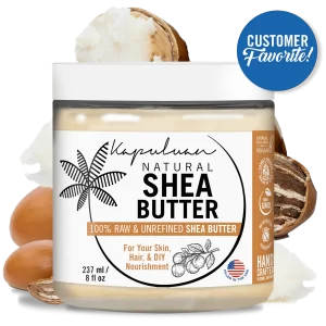 Image of a jar of Natural Shea Butter. The label emphasizes that it is 100% raw and unrefined, suitable for skin, hair, and DIY nourishment. The product is vegan, non-GMO, and handcrafted. A blue badge states "Customer Favorite!" The jar has a capacity of 237 ml (8 fl oz).