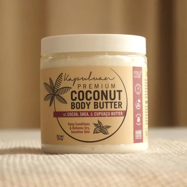A jar of Kapuluan Best Sellers Collection is shown on a light-colored surface. The label mentions it is designed for deep conditioning and relieving dry, sensitive skin. The container is 8 fl oz (237 ml).