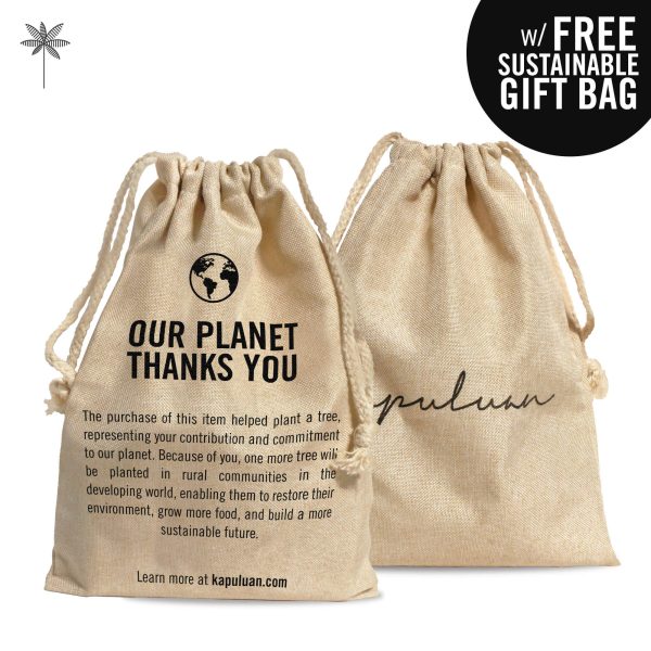 Supporting the planet with your purchase—sustainable Hair Repair Collection gift bags with a promise to plant trees.