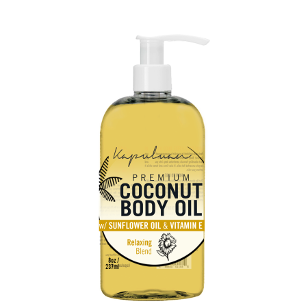 A clear bottle of kapuluan coconut body oil with sunflower oil and vitamin e, featuring a pump dispenser and black and yellow label design.