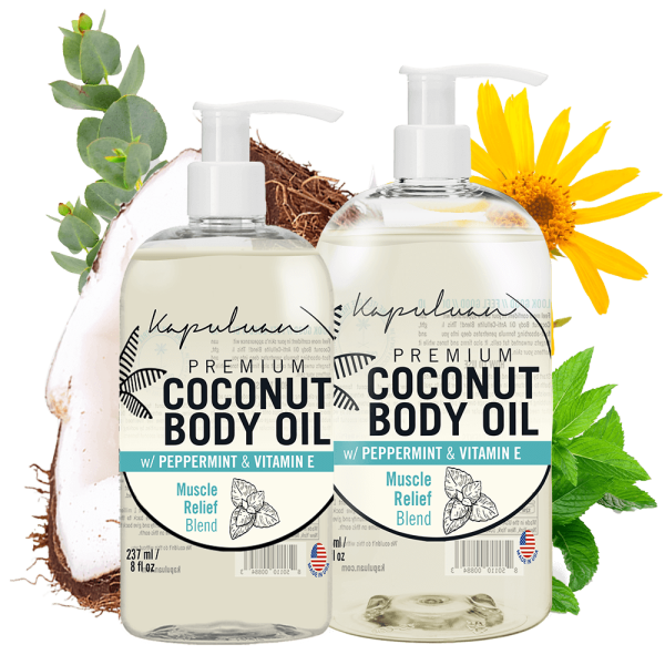 Two bottles of Sensual Coconut Body Oil are displayed with labels mentioning "Muscle Relief Blend." Coconut pieces, mint leaves, and Arnica flowers are arranged around them.