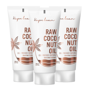 Three tubes of Cold-Pressed Raw Coconut Oil for skin and hair treatment, labeled as cold-pressed and natural, arranged upright with slight overlap.