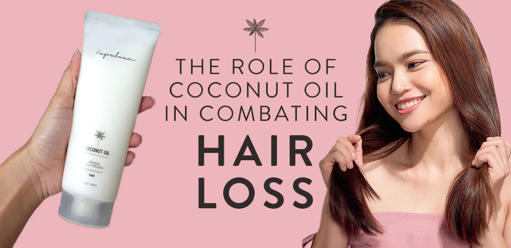 A smiling woman holds her hair next to an advertisement for a coconut oil hair product with text "the role of coconut oil in combating hair loss.